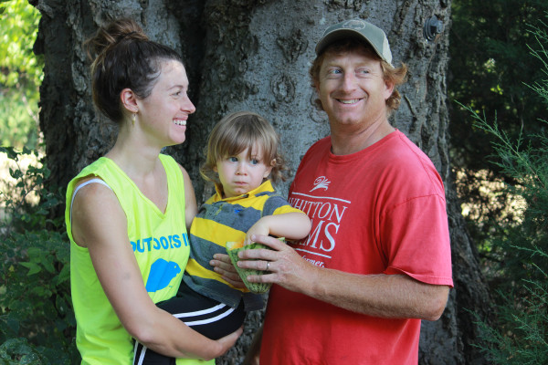 Jill and Keith Forester snack on a fresh melon with their son Fox. "Fox's world is very big for a two-year-old," Jill says.