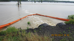 Two culverts divert water and oil from the cove into Lake Conway. -- Genieve Long