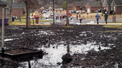 Dilbit surrounded homes and ran down the street of the subdivision.