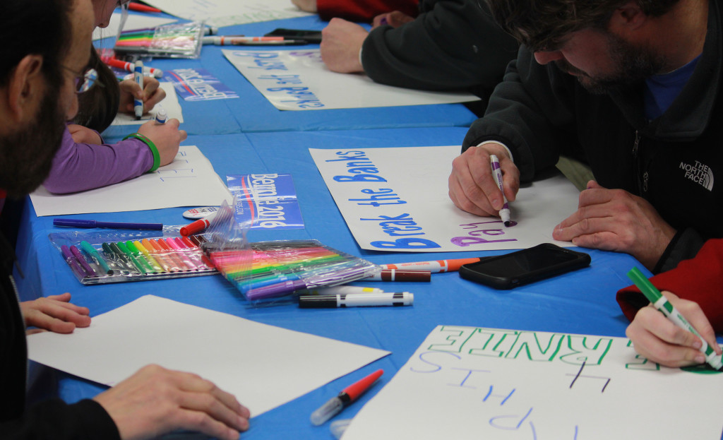 Grownups and kids were encouraged to paint signs. All supplies courtesy of the Sanders campaign.